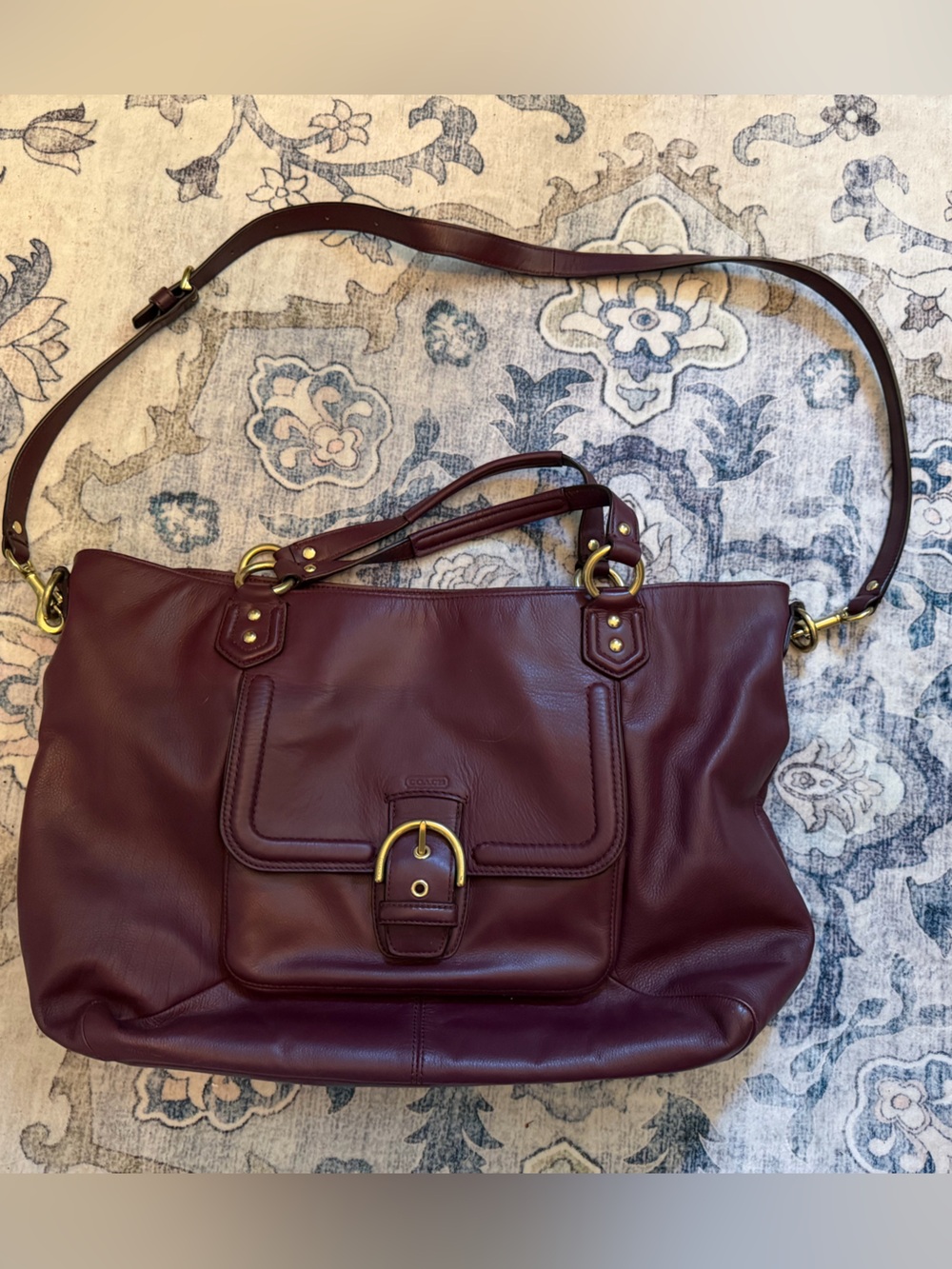 Coach Campbell Belle Carryall handbag in Burgundy with gold buckle detail